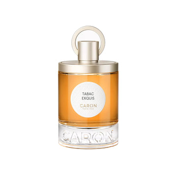 Caron Tabac Exquis Eau de Parfum in clear glass bottle with gold cap and amber liquid