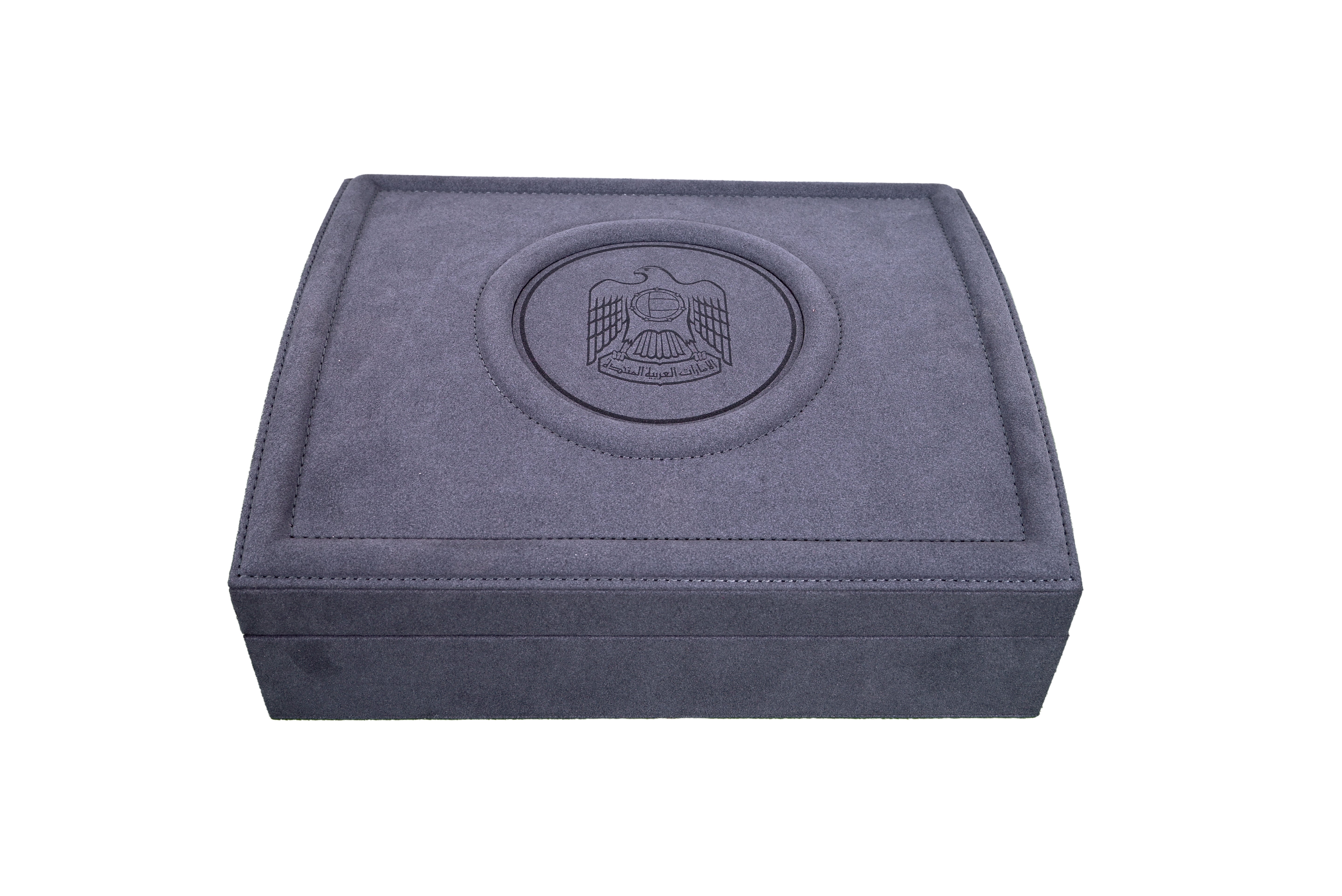 Scent Library charcoal velvet fragrance box with embossed emblem and soft textured finish