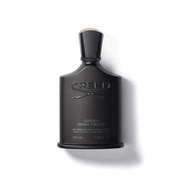 Creed Green Irish Tweed 100ml perfume bottle in sleek black design with embossed logo and cap