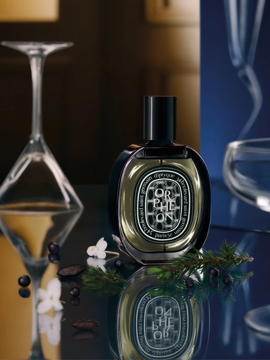 Diptyque Orpheon Eau de Parfum bottle showcasing elegant design on a reflective surface