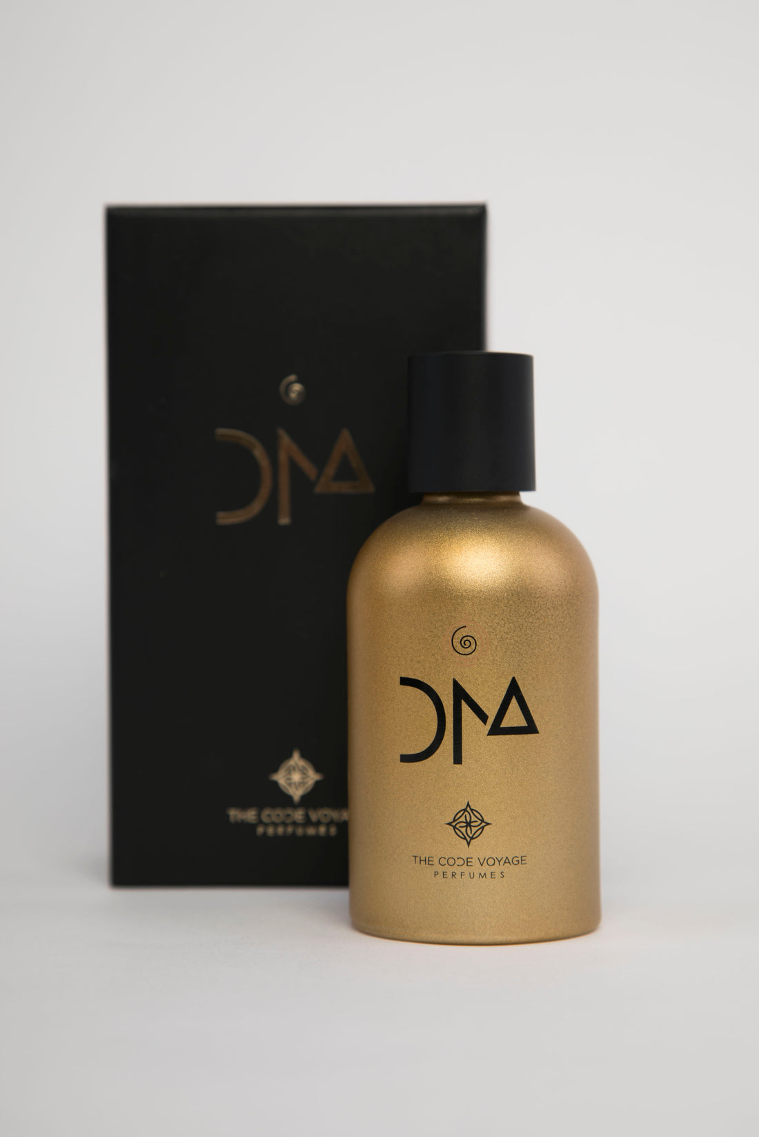 DNA niche perfume by THE CODE VOYAGE in a gold bottle for distinctive fragrance lovers