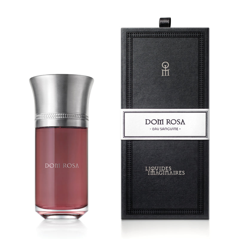 Dom Rosa niche perfume by Liquides Imaginaires in elegant dark pink bottle with silver cap