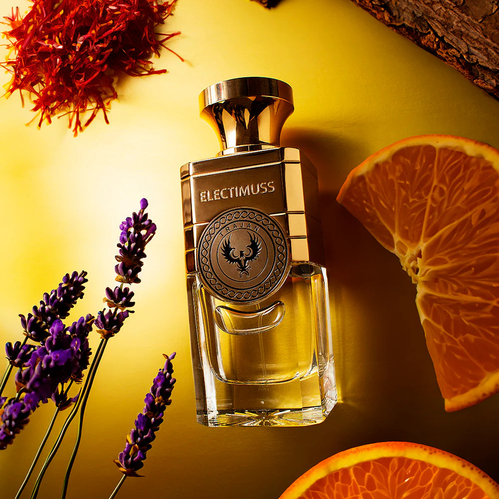Electimuss Trajan perfume 100ml bottle with lavender and orange slices on golden background