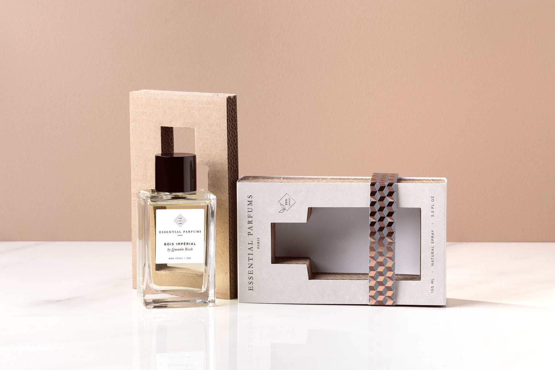 Essential Parfums Bois Imperial Eau de Parfum bottle with open beige textured box on white surface