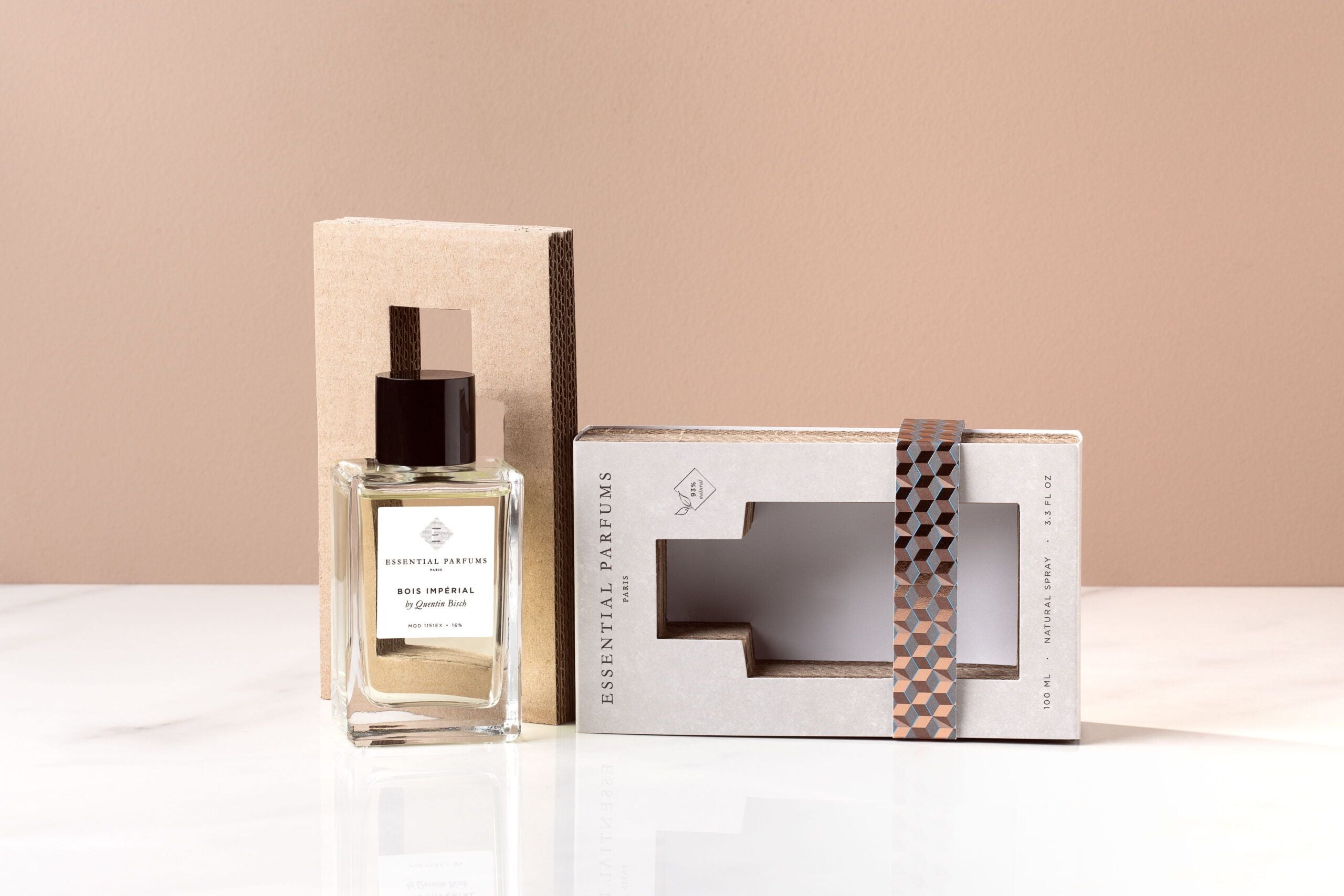 Essential Parfums Bois Imperial Eau de Parfum bottle with open beige textured box on white surface