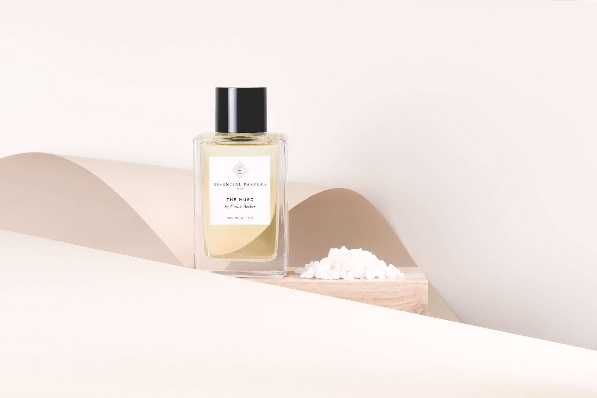 Essential Parfums The Musc 100ml perfume bottle with elegant minimalist design on beige background