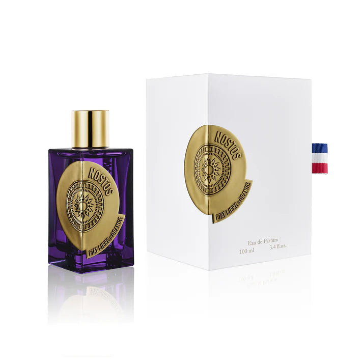 Etat Libre d'Orange Nostos perfume in a unique purple bottle with a gold emblem