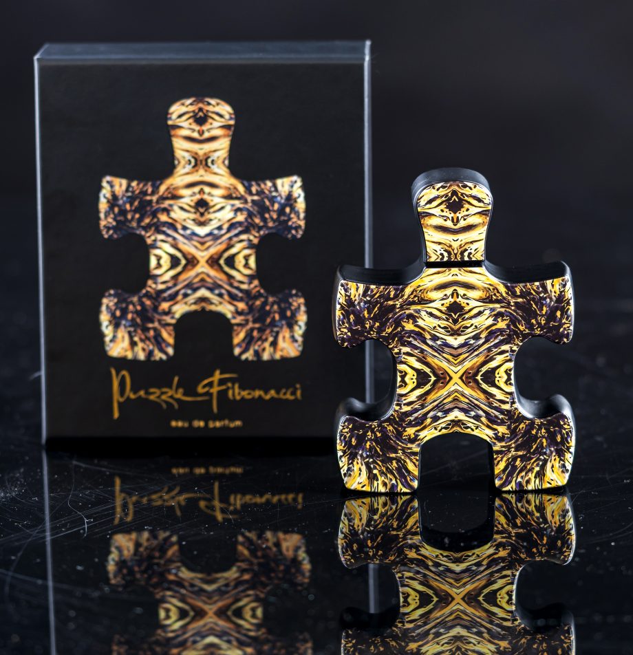 Puzzle Perfume Fibonacci perfume Dubai with artistic puzzle piece shaped bottle and black and gold design