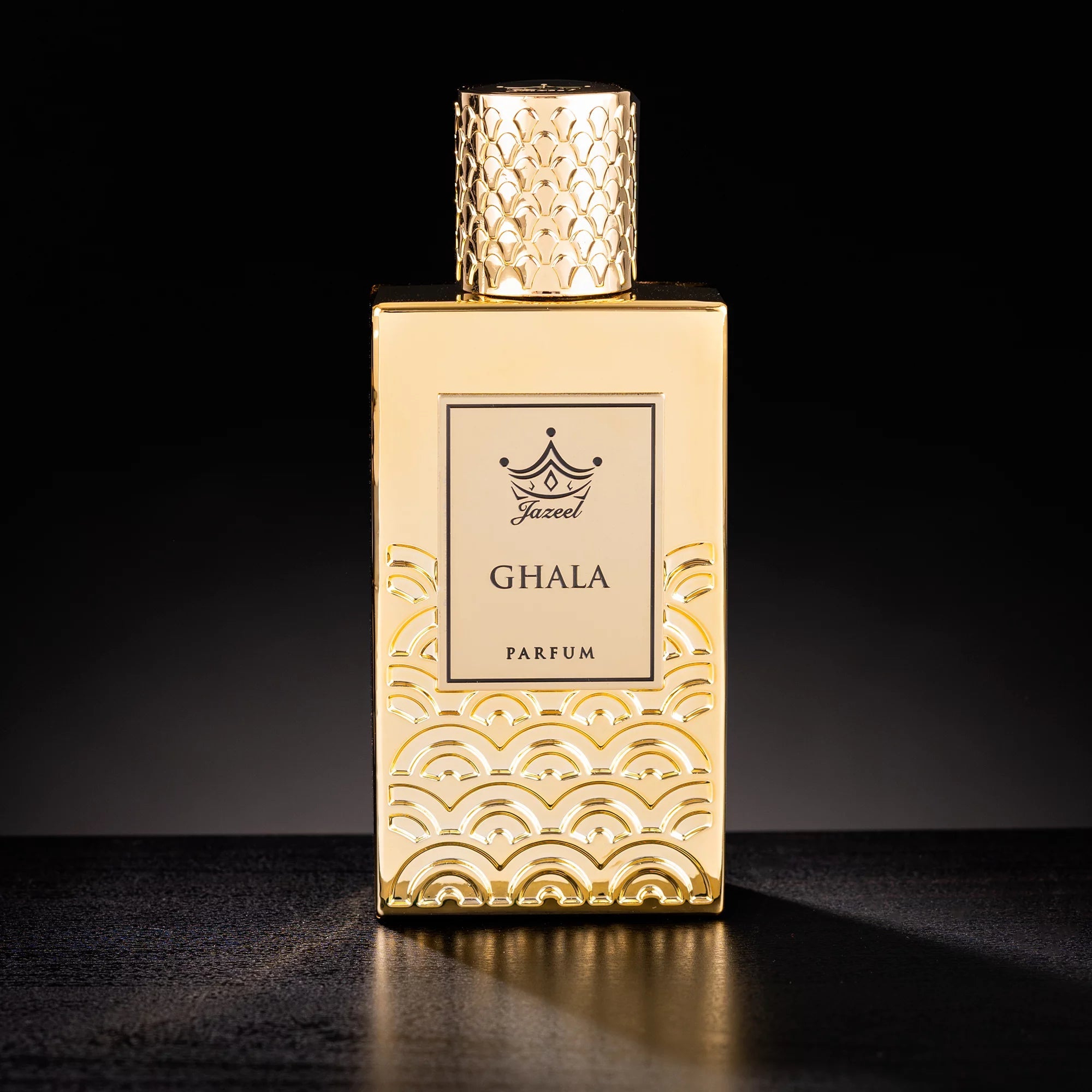 Jazeel Ghala Eau de Parfum for men and women in an elegant gold bottle with waving design