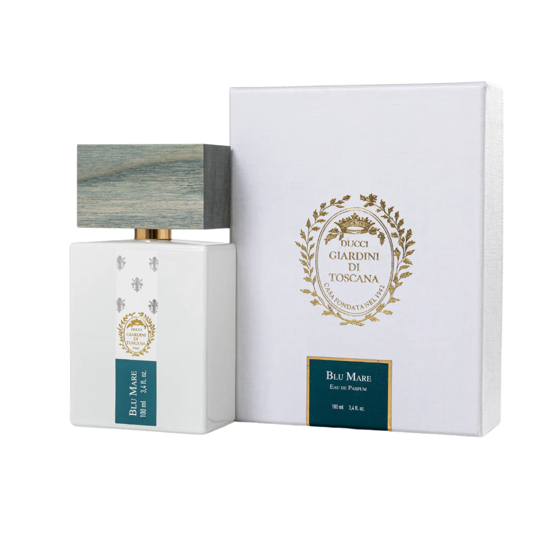 Giardini Di Toscana Blu Mare perfume bottle and white box with gold and blue accents
