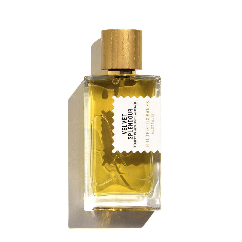 Goldfield & Banks Velvet Splendour niche perfume bottle with golden cap and amber liquid inside