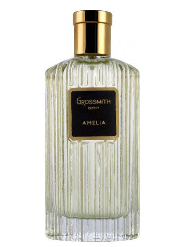 Amelia Grossmith perfume for women in a clear textured glass bottle with a gold cap and black label