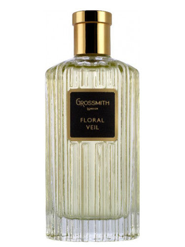 Grossmith Floral Veil perfume bottle with gold cap and textured clear glass design