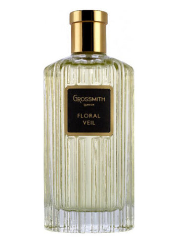 Grossmith Floral Veil perfume bottle with gold cap and textured clear glass design