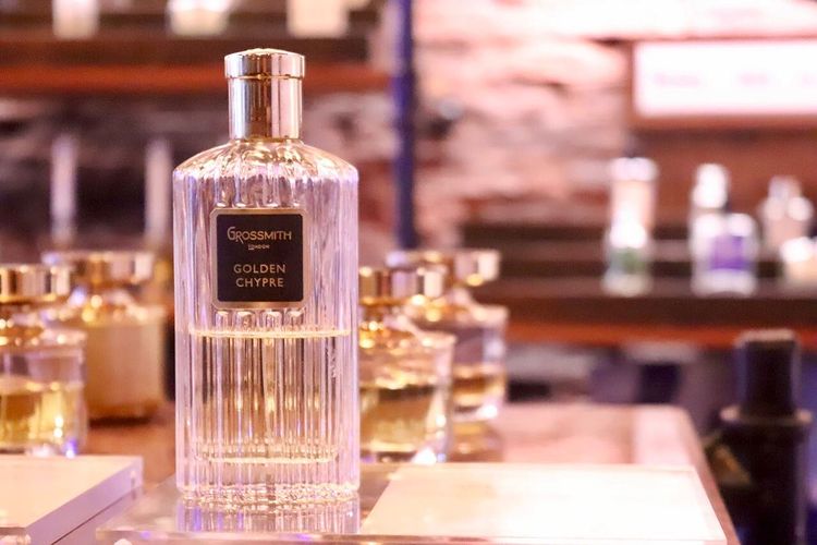 Grossmith Golden Chypre perfume bottle with gold cap and elegant ribbed glass design on display