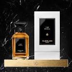 Guerlain Cuir Beluga perfume in a stylish bottle with a sleek box on a dark marble background
