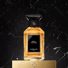 Guerlain Cuir Beluga perfume in an elegant bottle with a rich amber hue against a dark background
