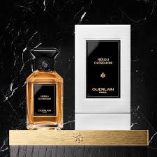 Guerlain Neroli Outrenoir 100ml Perfume Bottle with Elegant Packaging on Black Marble Background