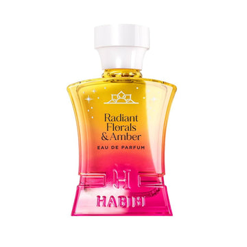 HABIBI NEW YORK Radiant Florals & Amber perfume in a pink and yellow gradient glass bottle with white cap