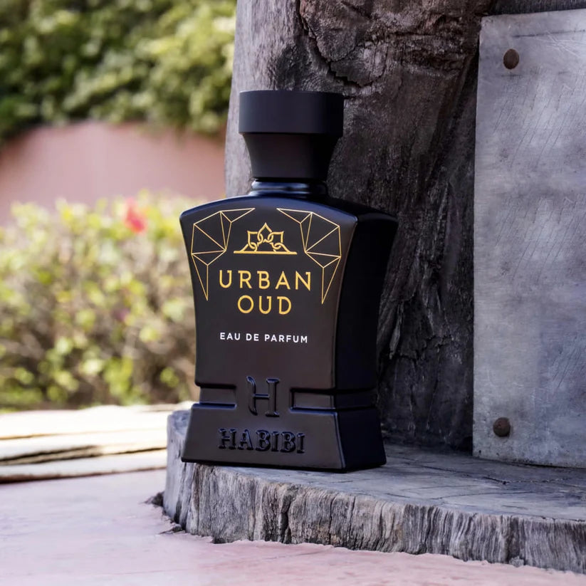 HABIBI NEW YORK Urban Oud perfume Dubai bottle in black with gold detailing on wooden surface