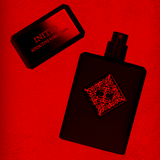 Initioparfums Addictive Vibration fragrance black spray bottle with decorative red label and matching cap on red background