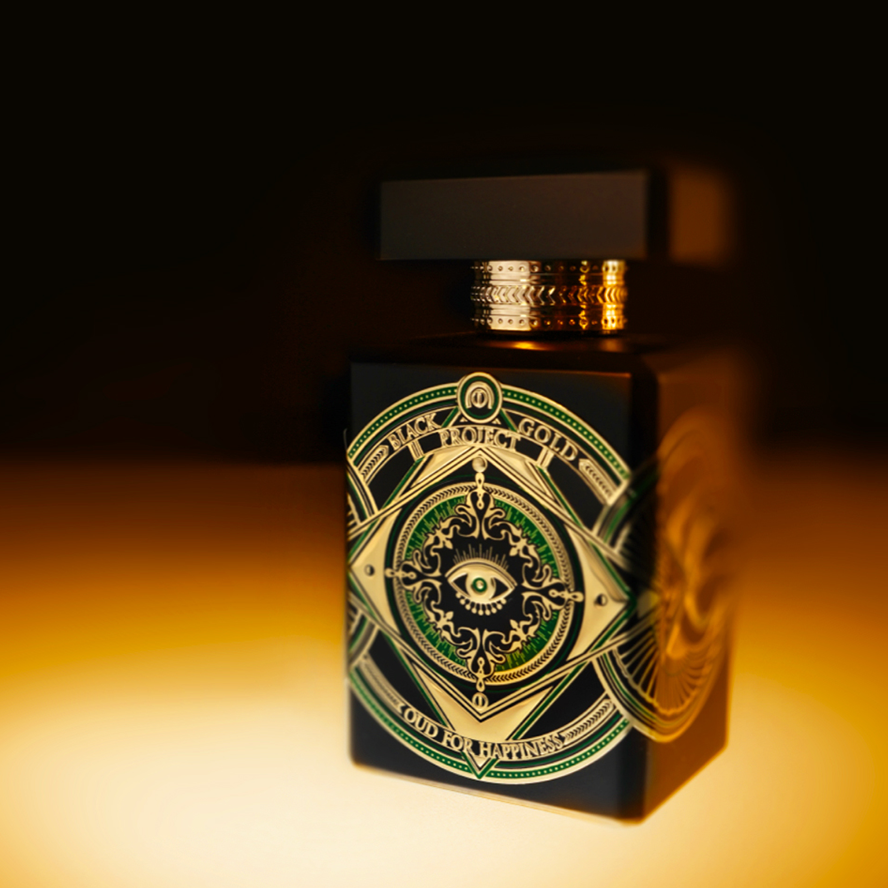 Black and gold luxury Oud for Happiness perfume bottle by initioparfums with intricate eye design