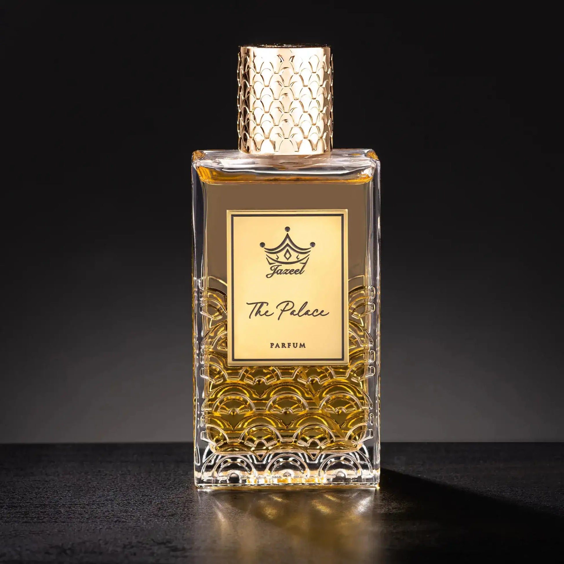 Jazeel Perfumes The Palace parfum 100ml luxury bottle with gold textured cap and intricate glass design
