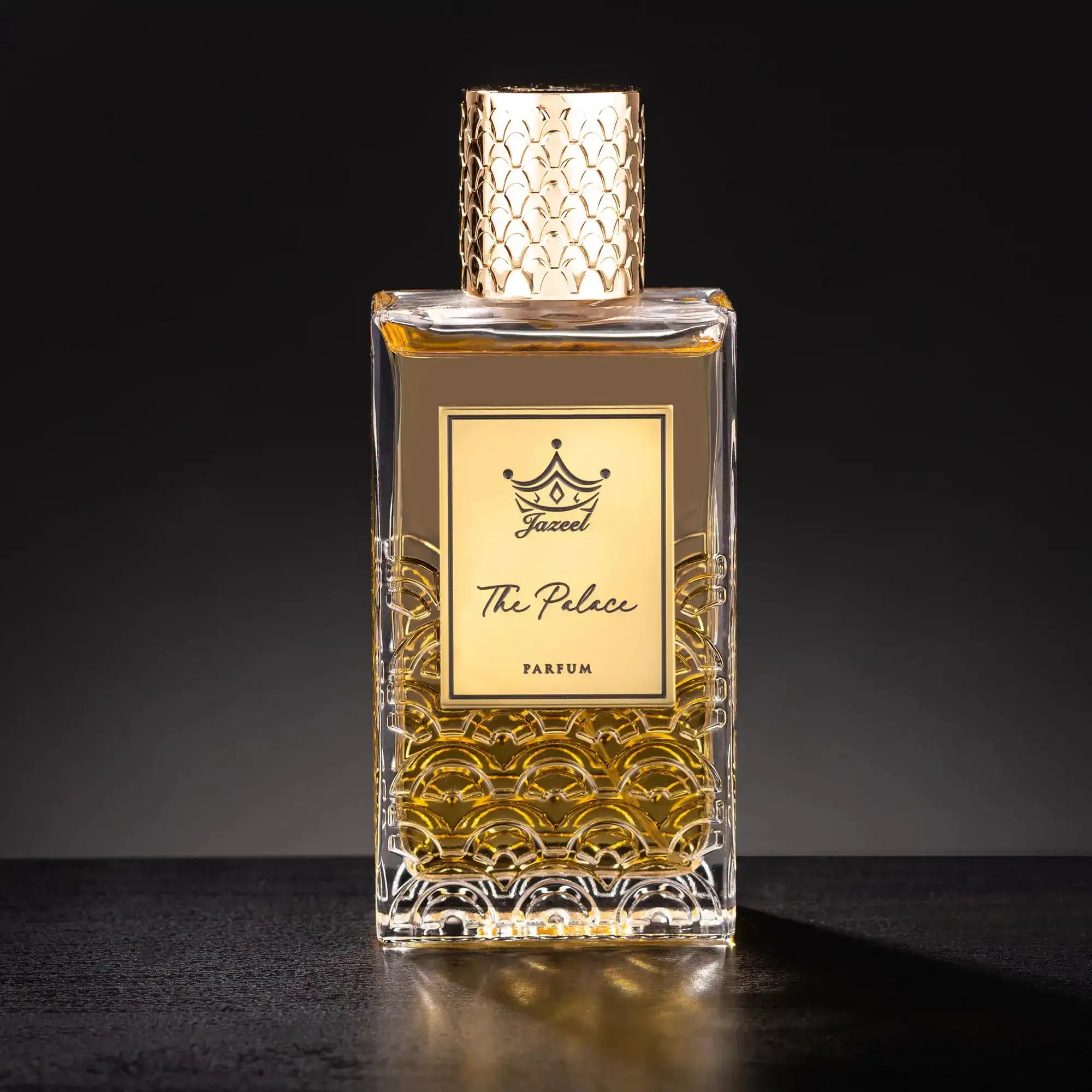 Jazeel Perfumes The Palace parfum 100ml luxury bottle with gold textured cap and intricate glass design