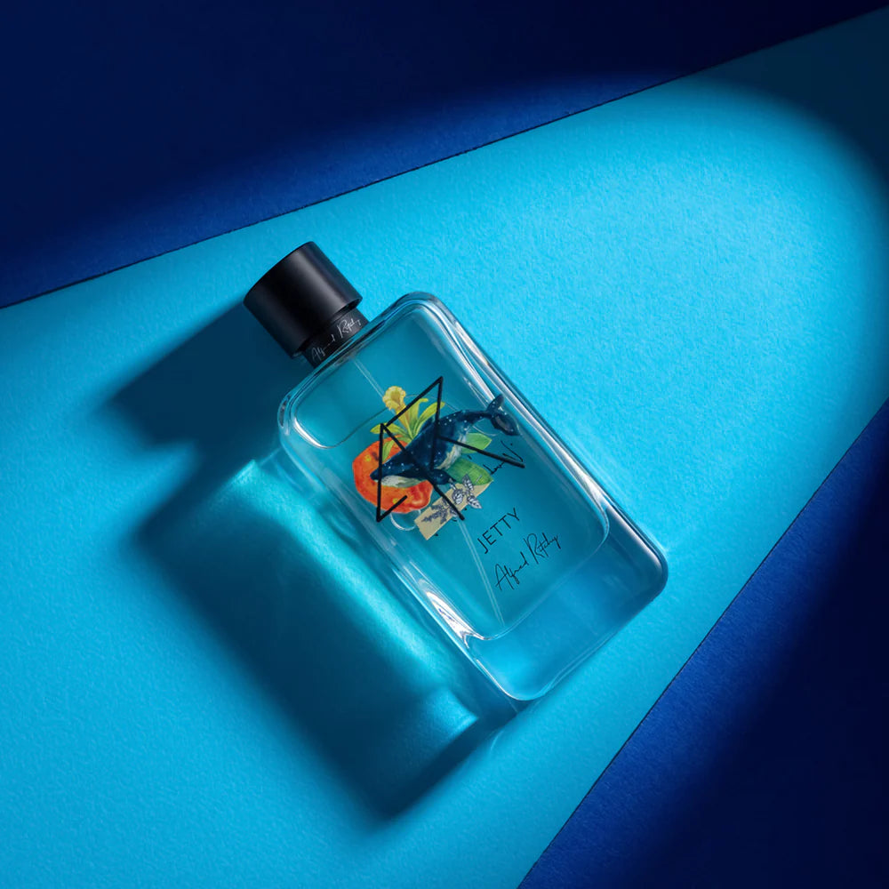 ALFRED RITCHY Jetty niche perfume bottle with floral design and matching striped gift box