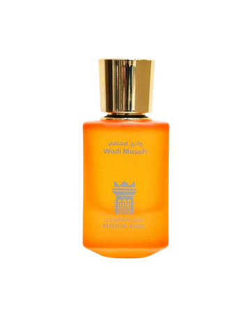 Wadi Masafi – After the Rain by Maison Asma, a frosted orange glass bottle with a faceted gold cap