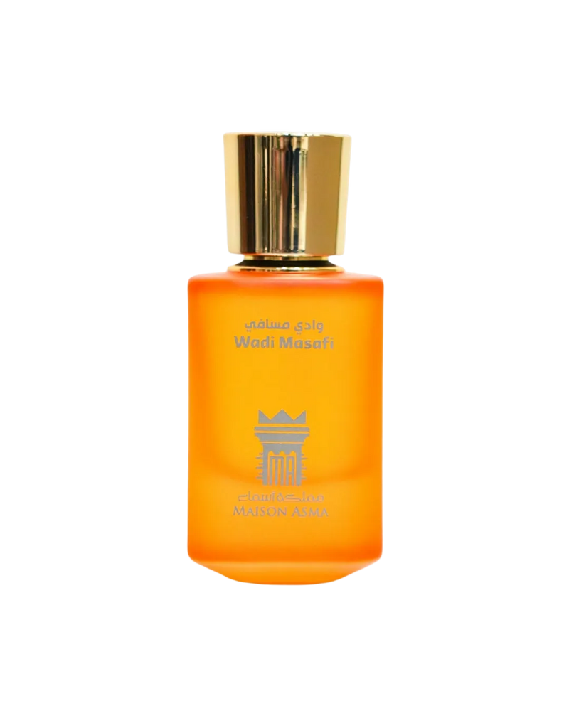 Wadi Masafi – After the Rain by Maison Asma, a frosted orange glass bottle with a faceted gold cap