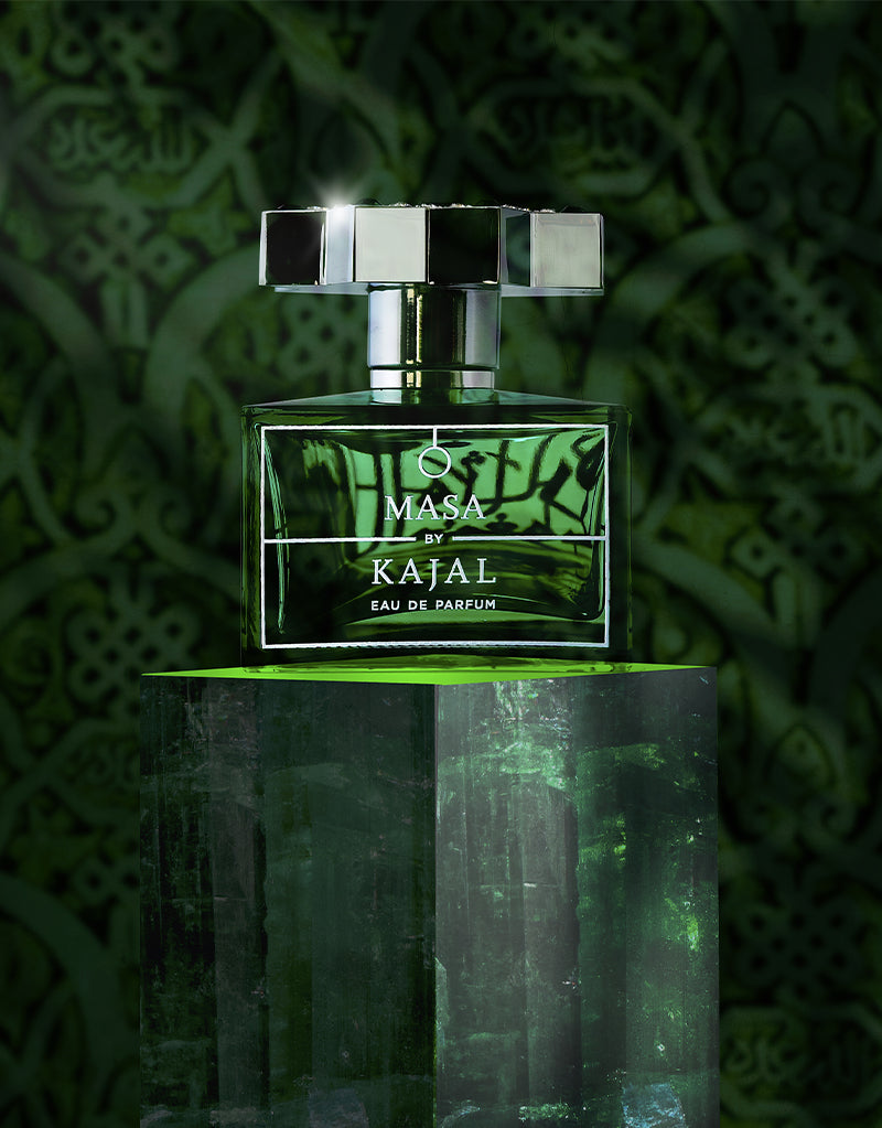 Masa By Kajal perfume online green glass bottle with silver cap on green textured background
