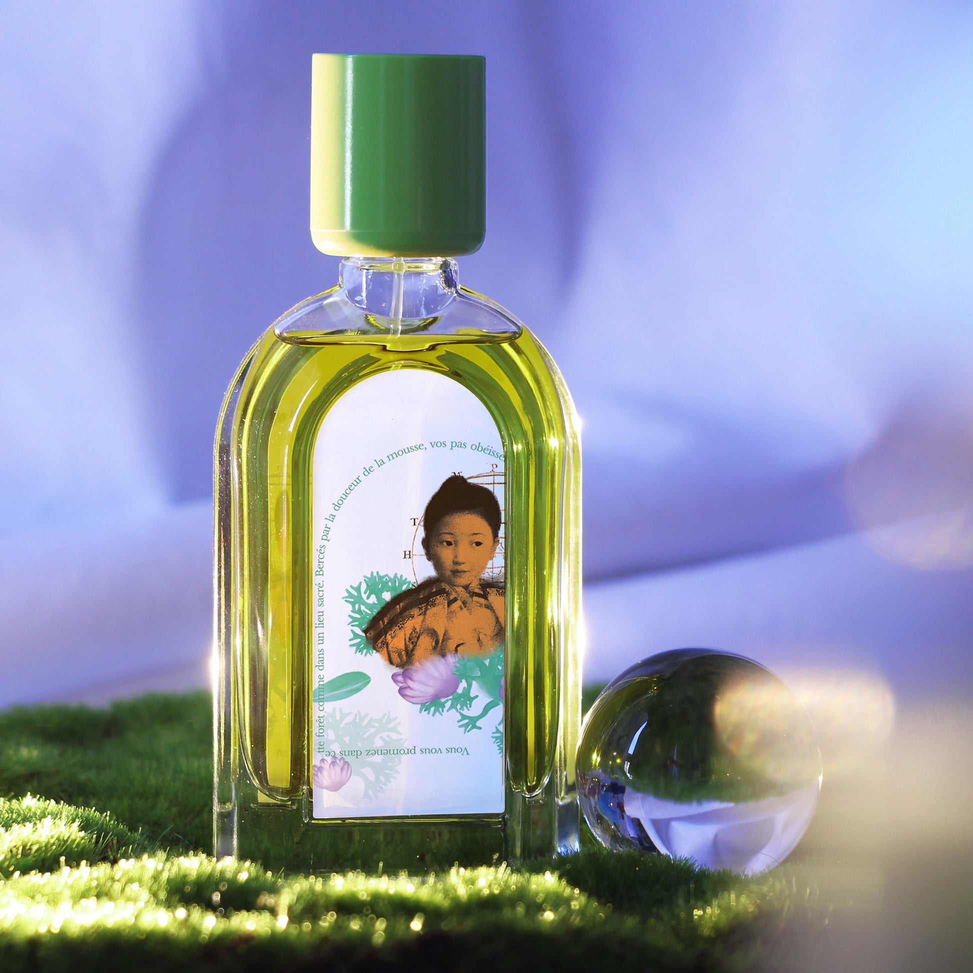 Stephane Humbert Lucas Mousse Arashiyama Eau de Parfum bottle with green cap on moss background