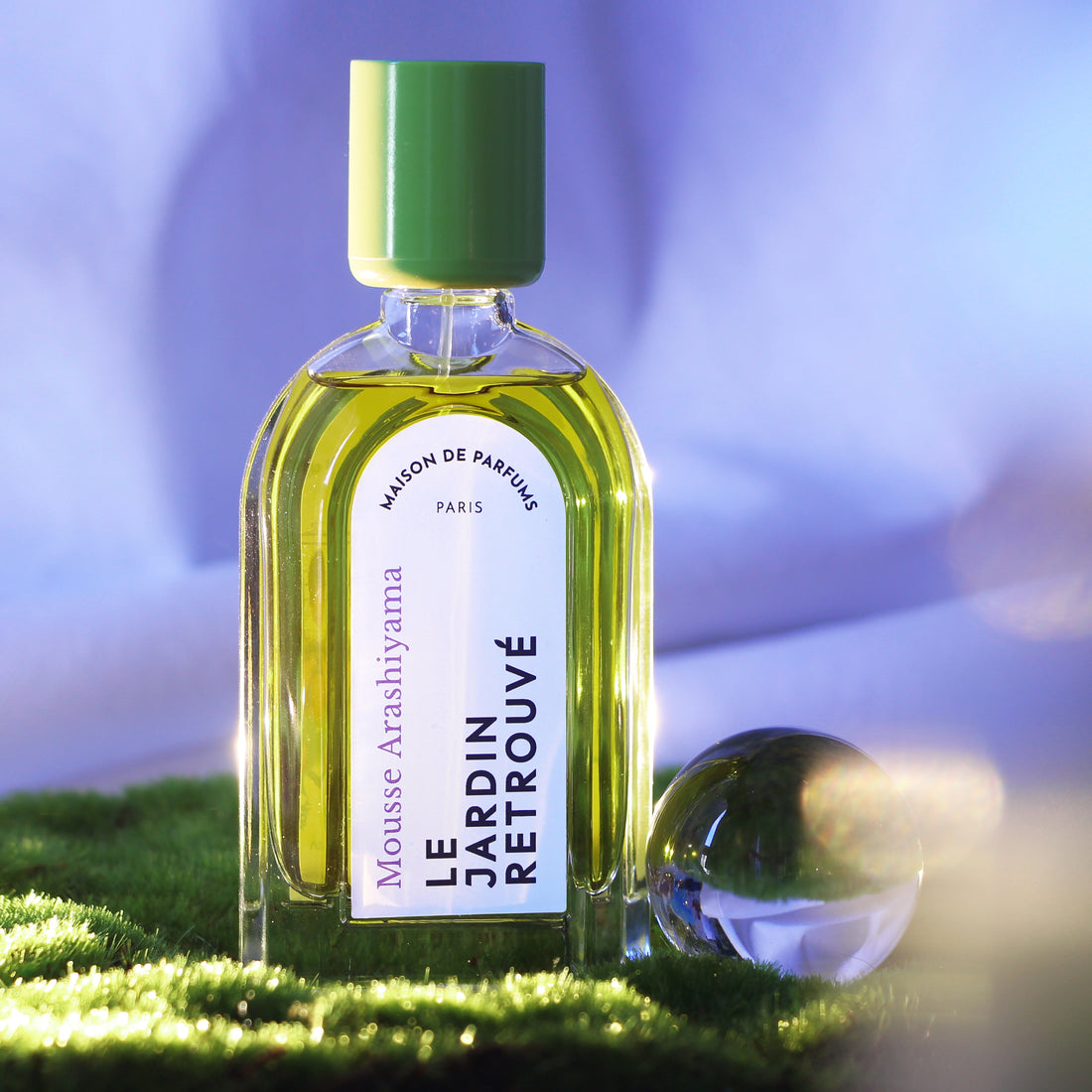 Stephane Humbert Lucas Mousse Arashiyama Eau de Parfum bottle with green cap and artistic packaging