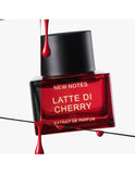 NEW NOTES Latte Di Cherry perfume bottle with red liquid dripping and black cap close up