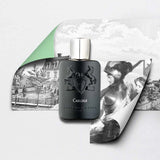 Parfums De Marly Carlisle EDP 125ml black bottle with silver cap on artistic vintage background