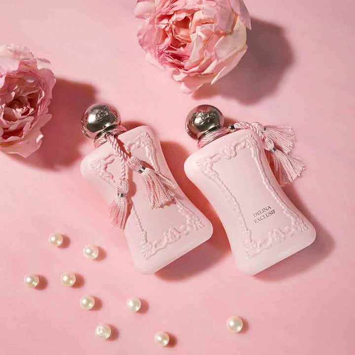Parfums De Marly Delina Exclusif 75ml perfume bottles in pink with floral and pearl accents