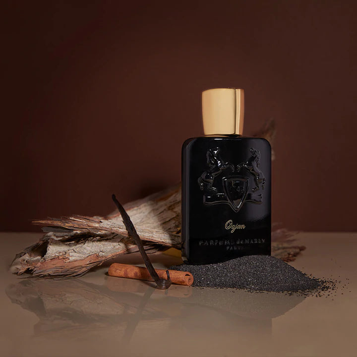 Parfums De Marly Oajan EDP 125ml online black bottle with gold cap surrounded by spice and wood accents