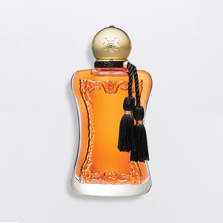 Parfums De Marly Safanad EDP perfume bottle with amber liquid and gold cap with black tassel