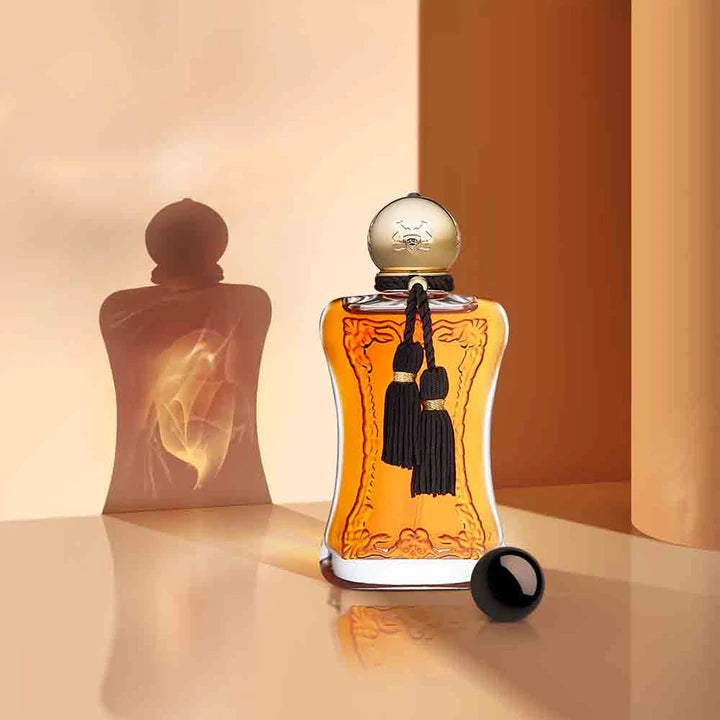 Parfums De Marly Safanad EDP perfume bottle with amber liquid and decorative black tassels