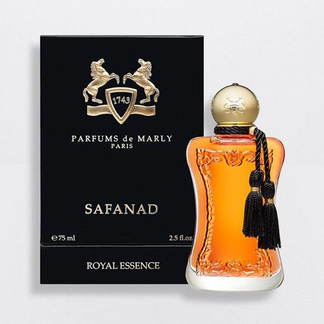Parfums De Marly Safanad EDP perfume bottle with amber liquid and gold cap with black tassel