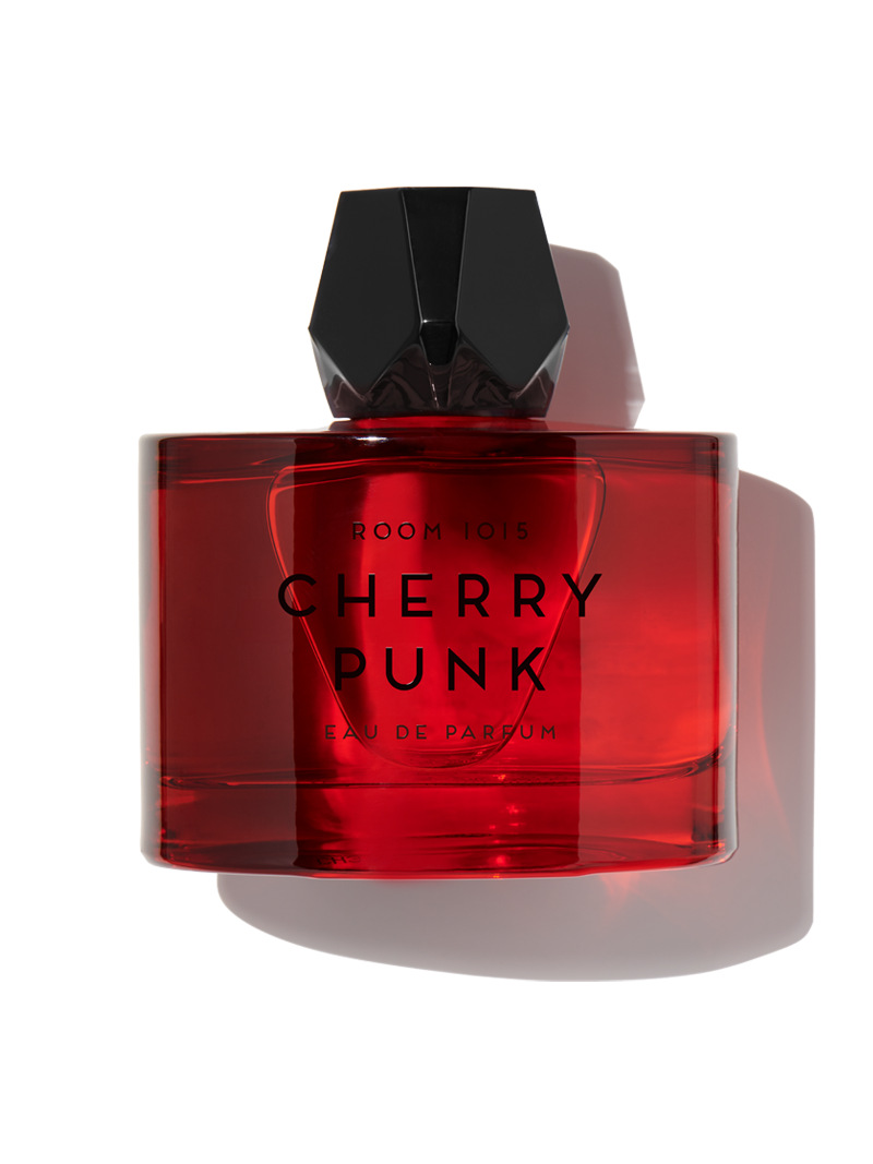 Room 1015 Cherry Punk perfume in a bold red bottle with a stylish black cap
