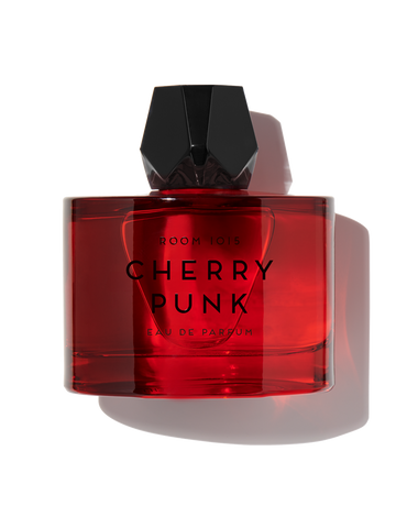 Room 1015 Cherry Punk perfume in a bold red bottle with a stylish black cap