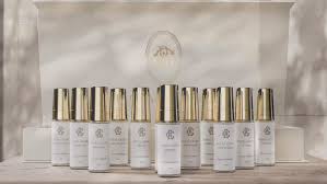ROYAL GLORY DISCOVERY SET featuring elegant white perfume bottles with gold caps in a stylish display box