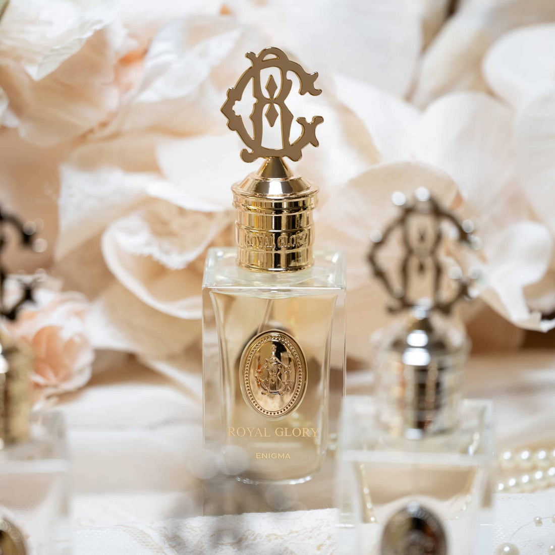 ROYAL GLORY ENIGMA 60ml niche perfume bottle with gold ornate cap and elegant design