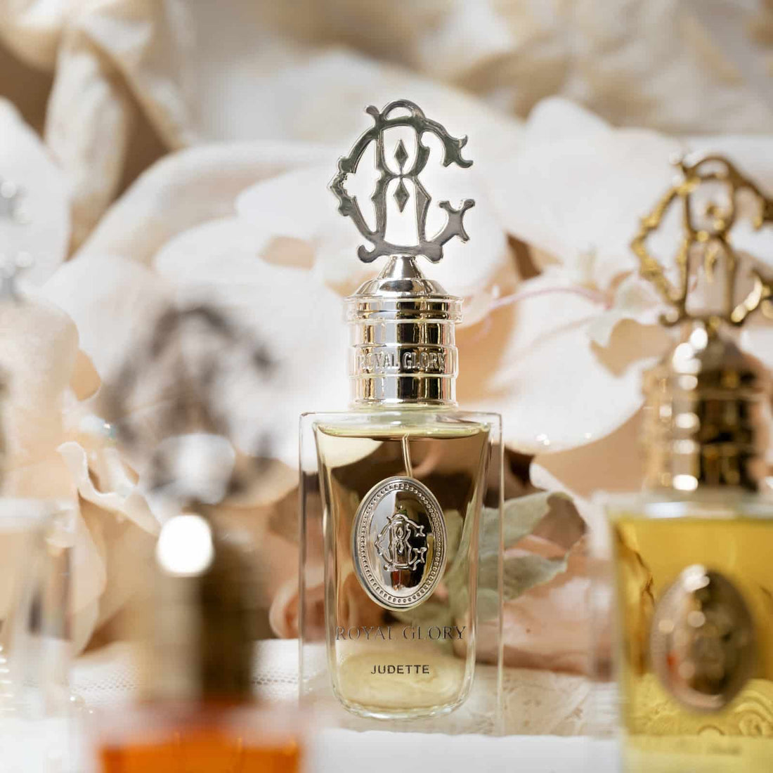 ROYAL GLORY Judette perfume 60ml bottle with silver decorative cap and light yellow fragrance