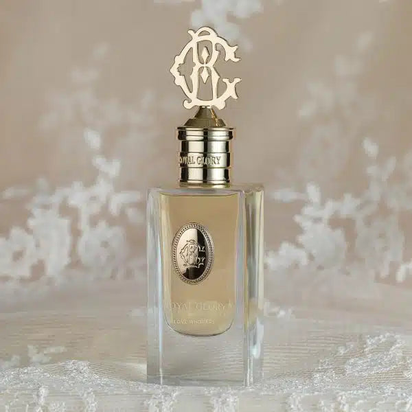 ROYAL GLORY LOVE WHISPERS perfume Dubai displayed in elegant glass bottles with ornate gold and silver caps