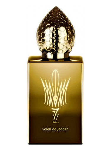Stephane Humbert Lucas Soleil de Jeddah perfume in a gold decorative bottle with honeycomb cap
