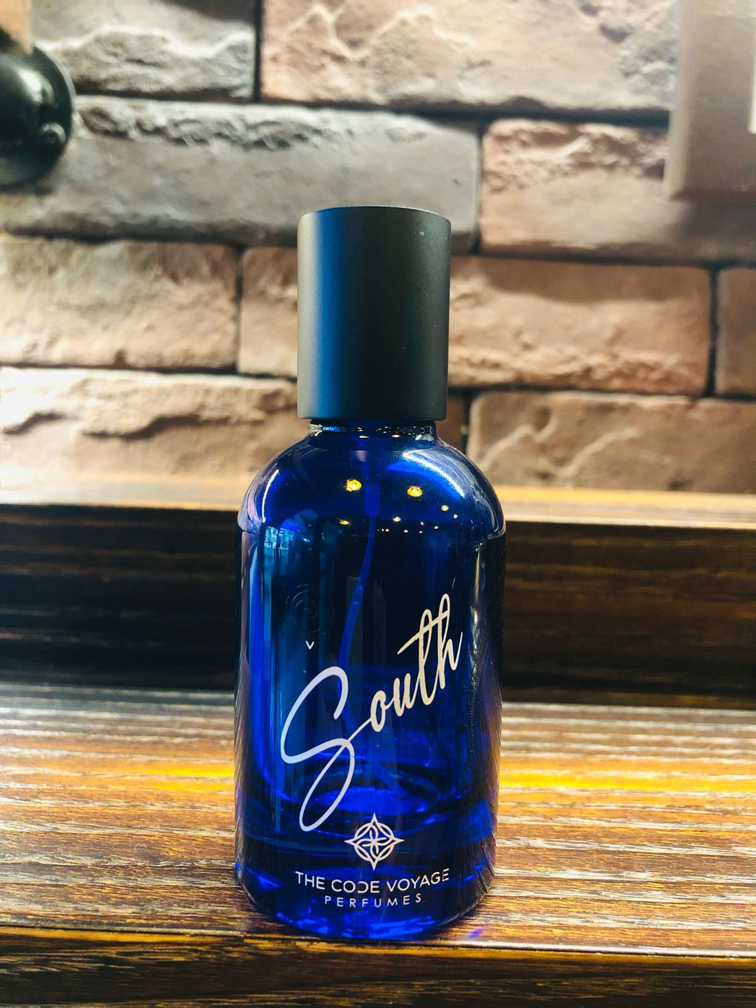 South niche fragrance in a blue bottle by THE CODE VOYAGE, ideal for unique scent lovers