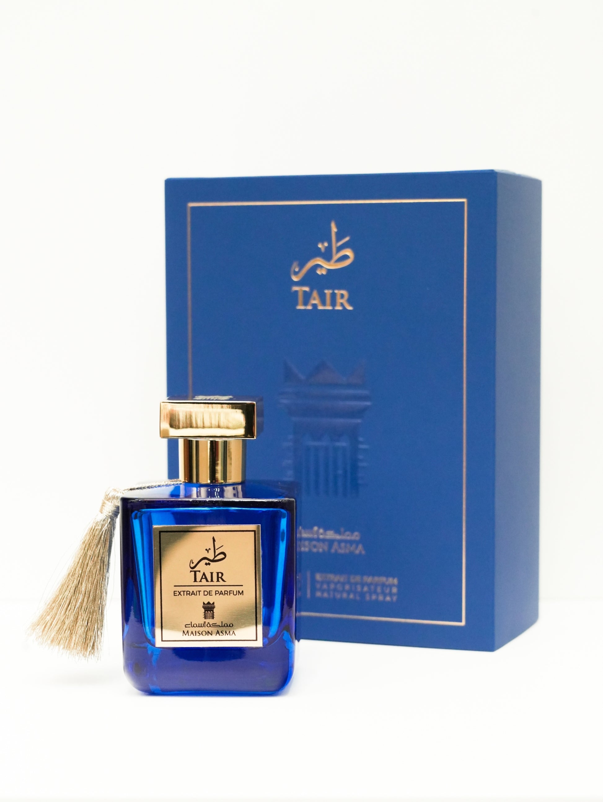 Maison Asma Tair niche fragrance Dubai perfume bottle in blue with gold cap and matching box